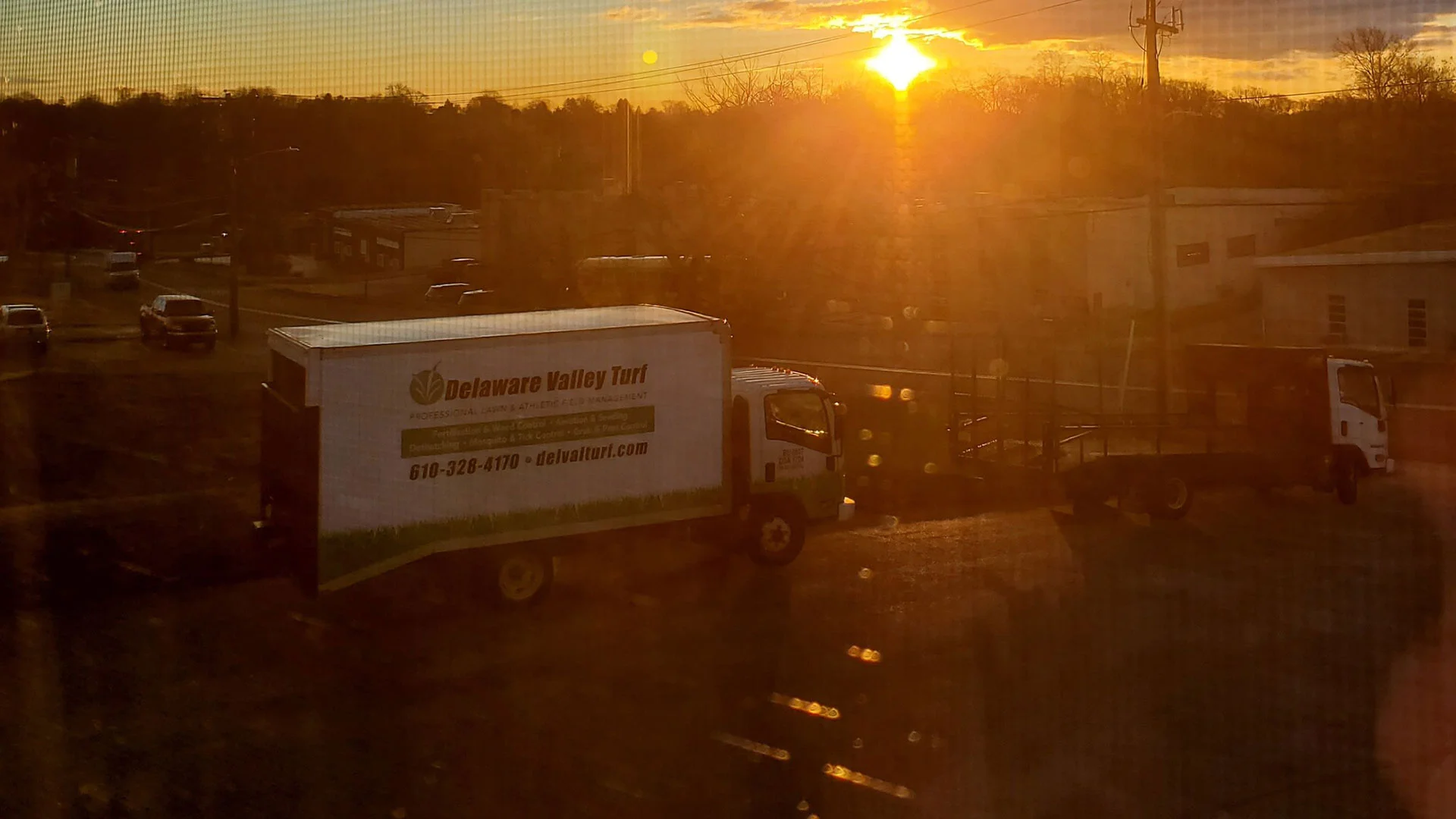 The sun is setting at the end of a work day.