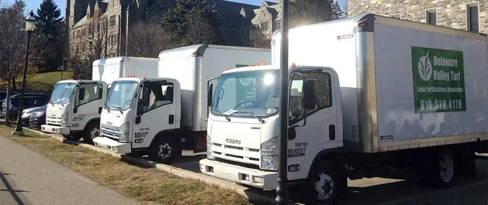 The Delaware Valley Turf lawn care and pest control service truck fleet in Wilmington, DE.